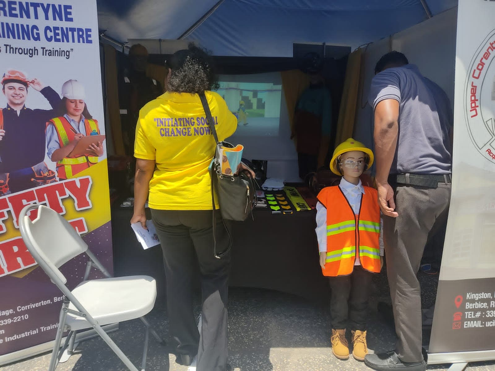People at a UCITC-branded safety awareness booth
